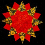Red, gold and blue fabrics with space images make up a fabric sun which sits on a black, starry background